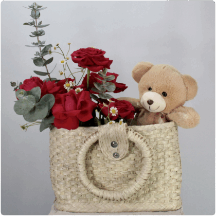 Arreglo de rosas rojas + un peluche con base tipo bolso de mano
