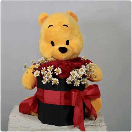 Arreglo de rosas rojas + un peluche winnie pooh