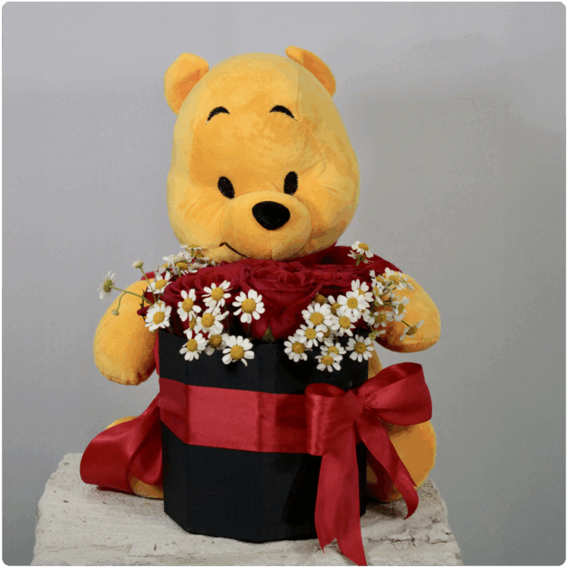 Arreglo de rosas rojas + un peluche winnie pooh