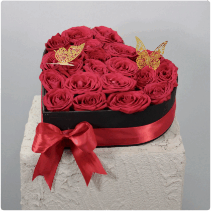 Arreglo de rosas rojas en forma de corazón