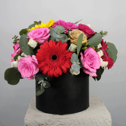 Arreglo floral de  rosas +  gerberas con base de madera
