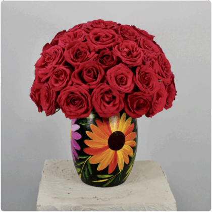 Arreglo floral de  rosas con base artesanal
