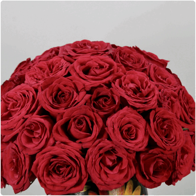 Arreglo floral de  rosas con base artesanal - Image 2