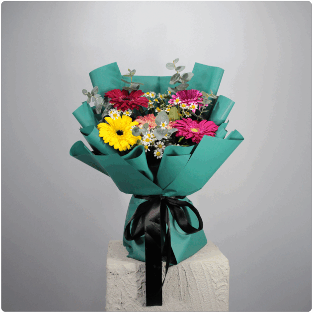 Arreglo floral de gerberas mixtas - Image 2